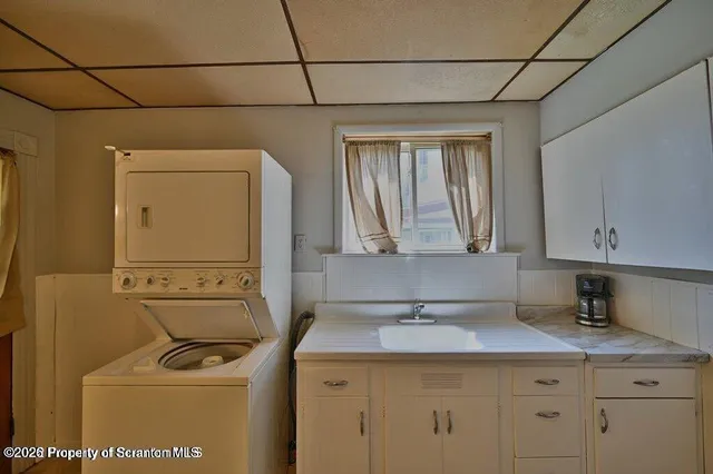 a view of a hallway with a window