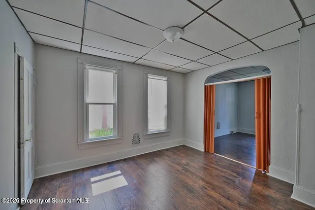 a bathroom with a toilet a sink and bathtub