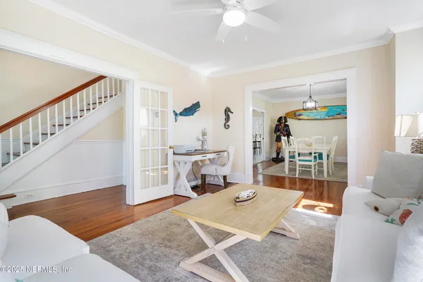 a living room with furniture and a table