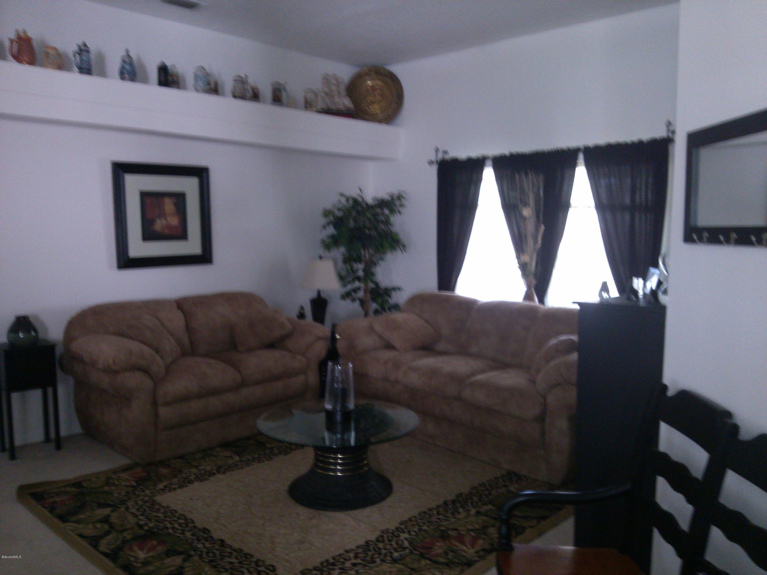 1631 Rustic Way Melbourne, FL 32935 - Photo 3 of 10 living rm