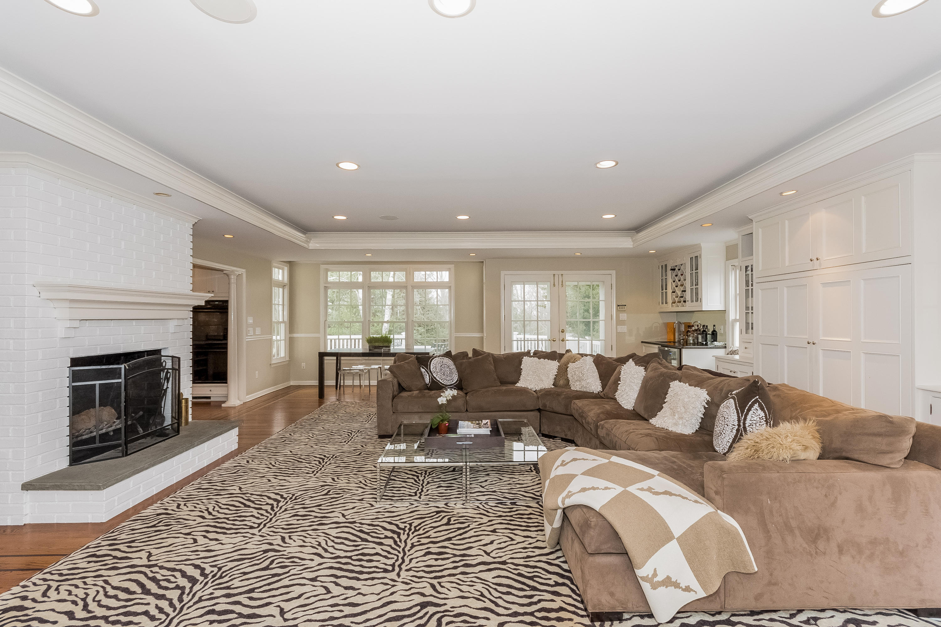 71 Peach Hill Road Darien, CT 06820 - Photo 15 of 42 a living room with furniture window and a fireplace