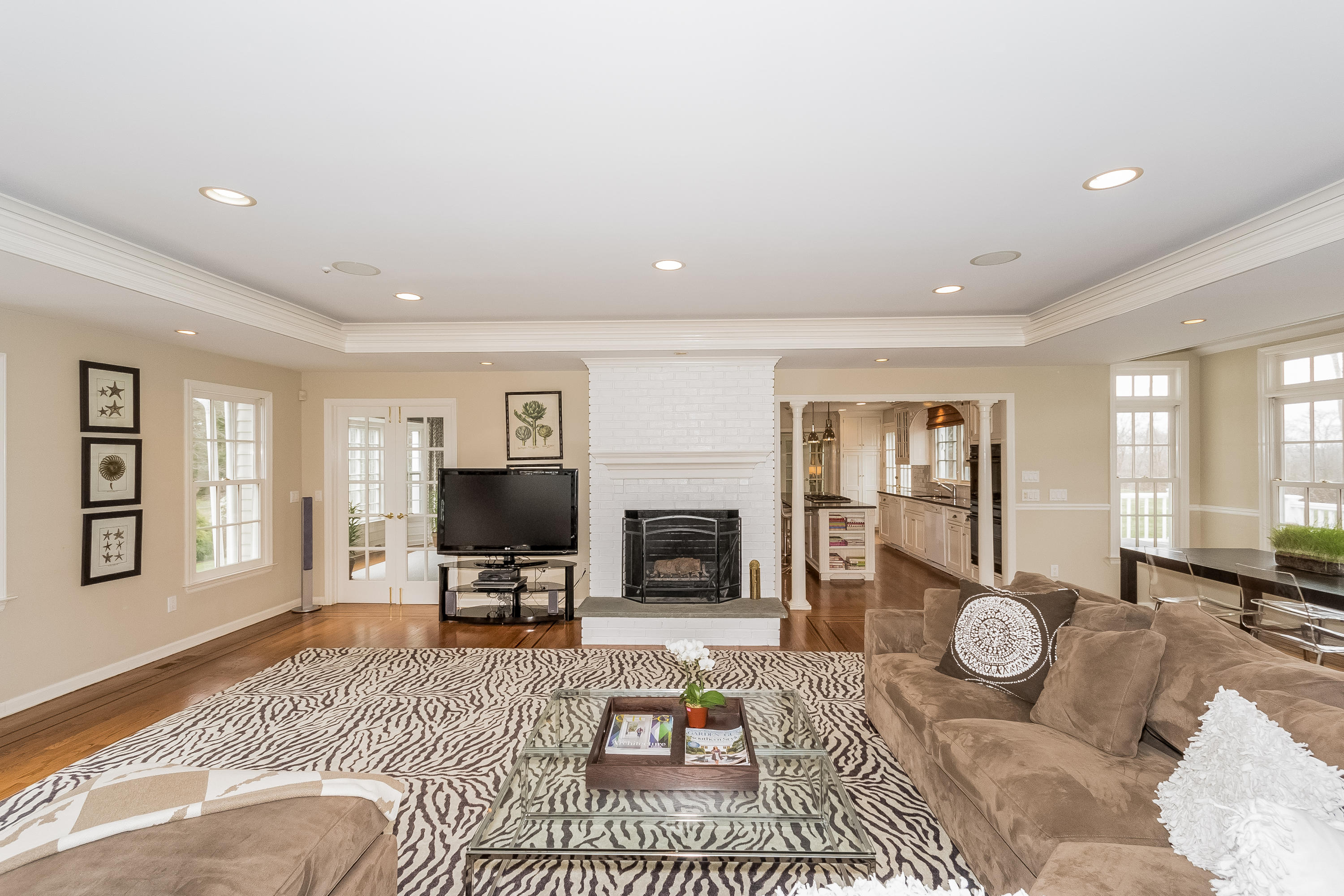 71 Peach Hill Road Darien, CT 06820 - Photo 16 of 42 a living room with furniture and a fireplace