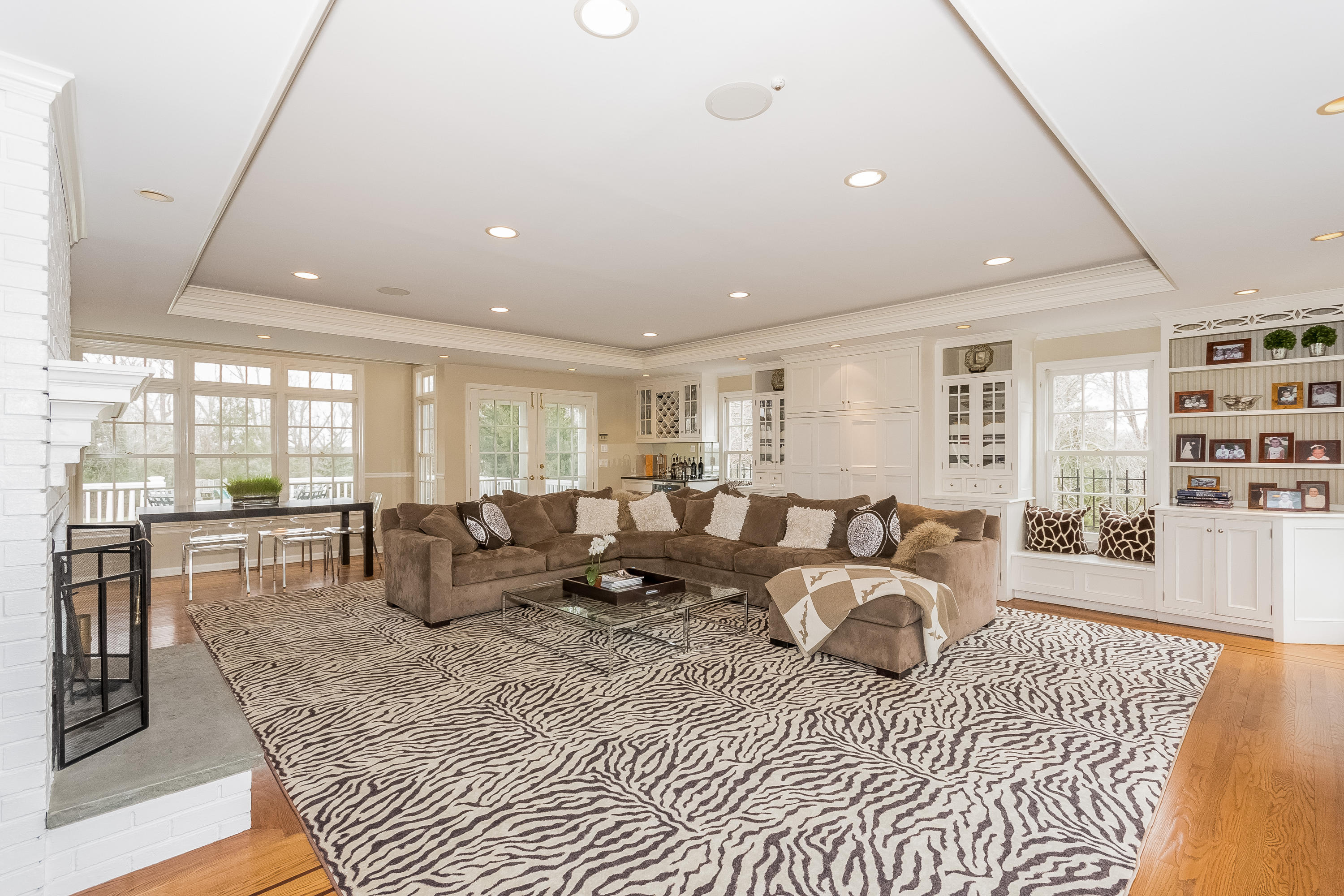 71 Peach Hill Road Darien, CT 06820 - Photo 17 of 42 a living room with furniture a rug and a table