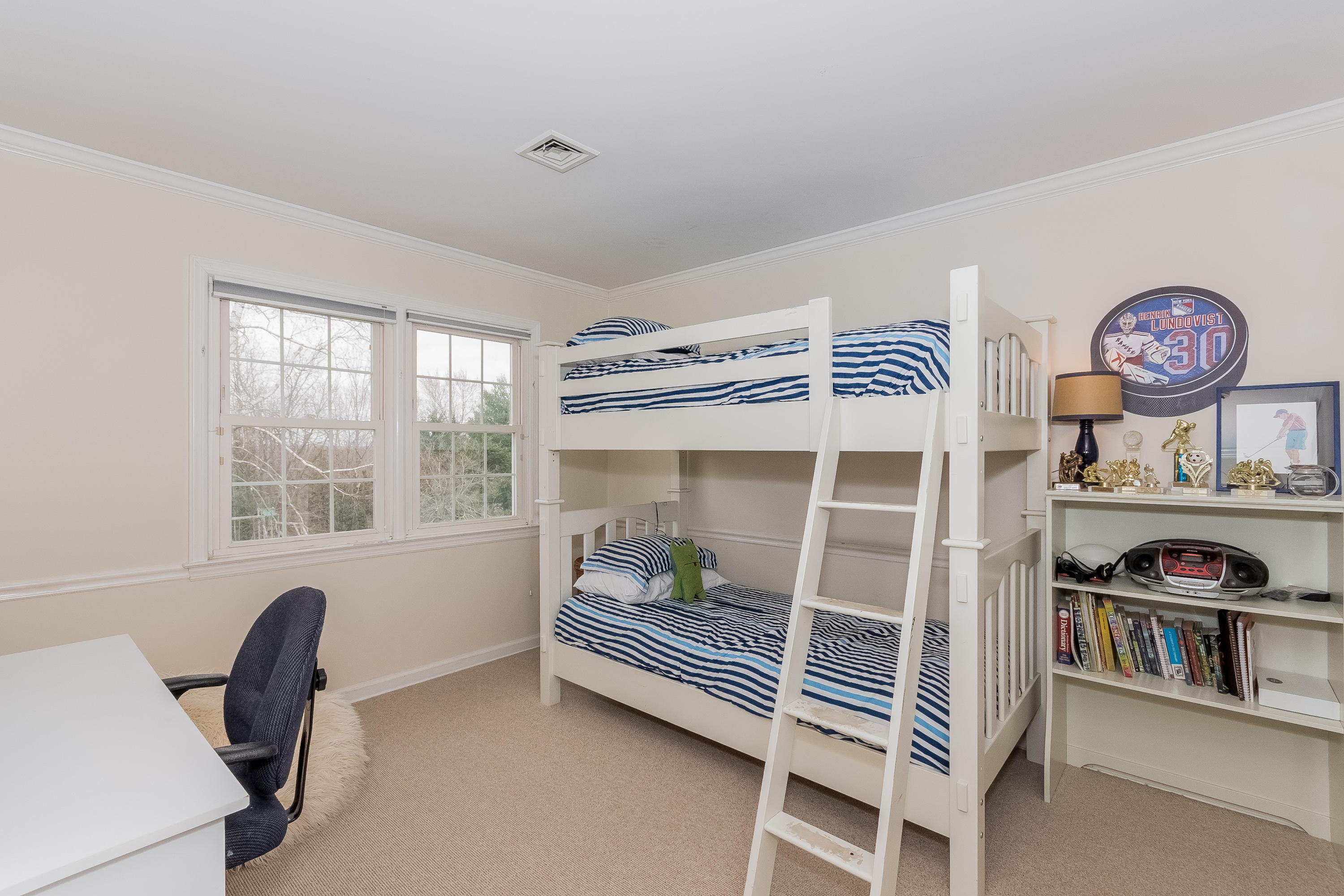 71 Peach Hill Road Darien, CT 06820 - Photo 22 of 42 a bedroom with furniture and a window