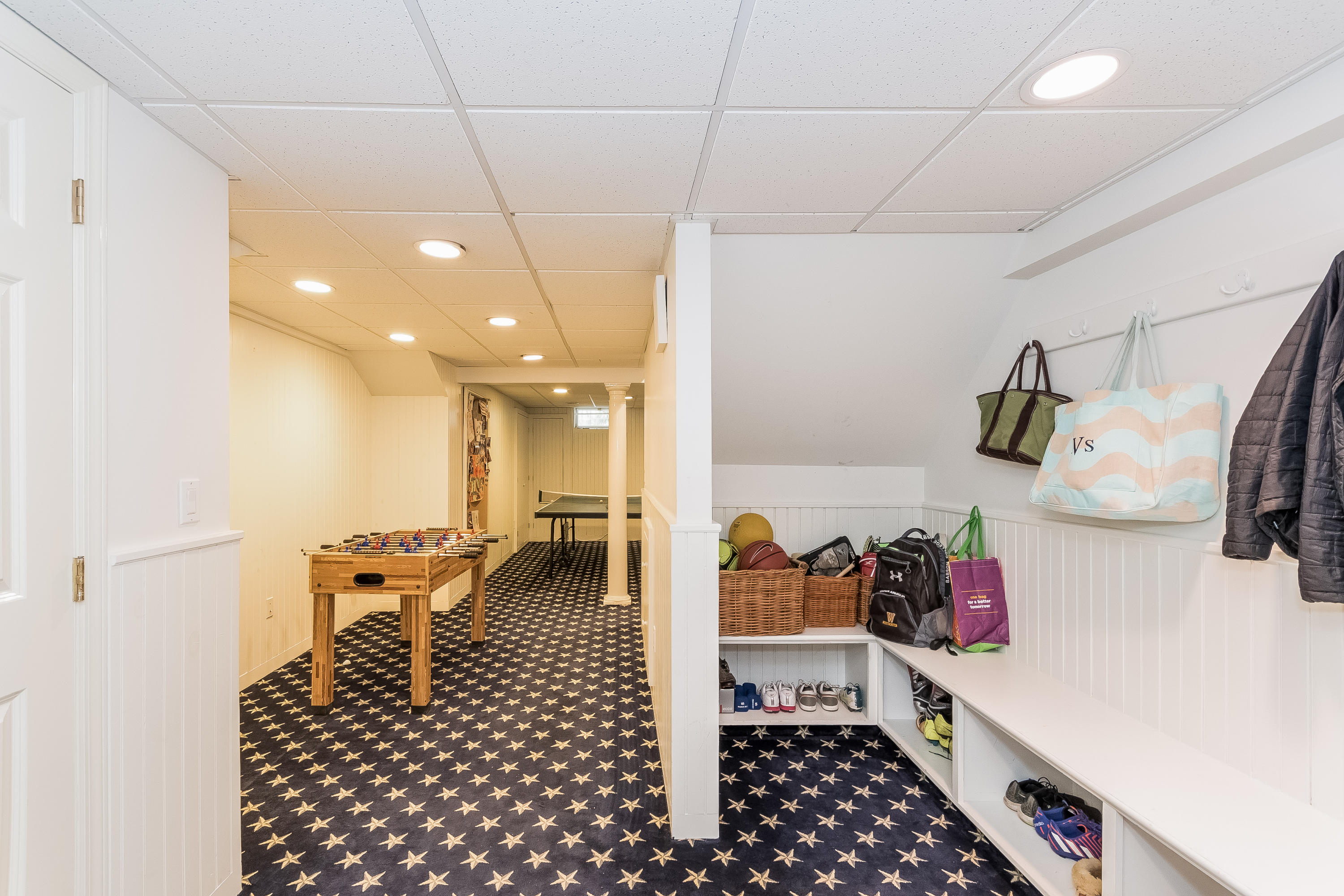 71 Peach Hill Road Darien, CT 06820 - Photo 31 of 42 a room with lots of white furniture and a shower