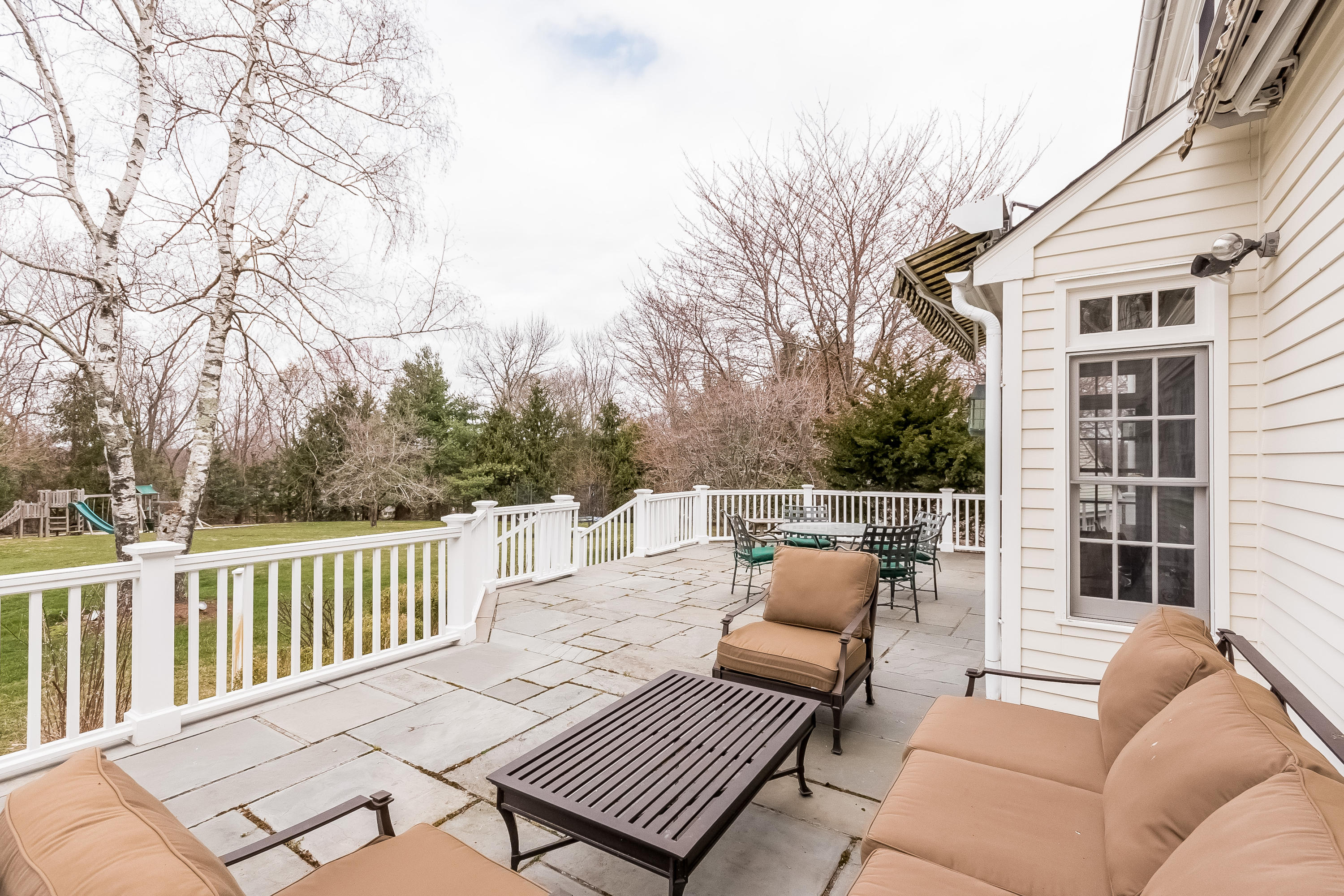 71 Peach Hill Road Darien, CT 06820 - Photo 33 of 42 a balcony view with a couch