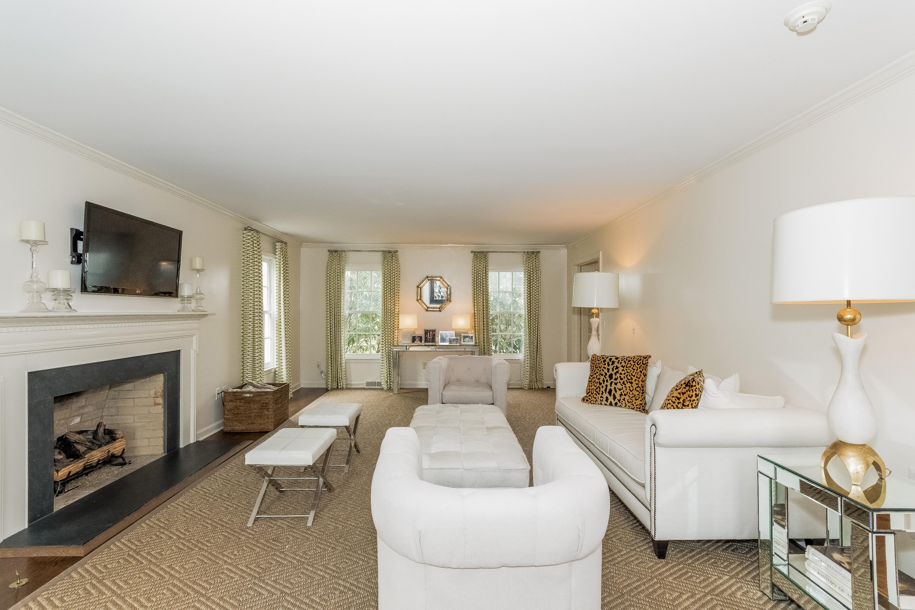71 Peach Hill Road Darien, CT 06820 - Photo 6 of 42 a living room with furniture and a fireplace