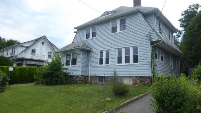 12 Risley Place New Rochelle, NY 10801 - Photo 1 of 1 a front view of a house with a yard