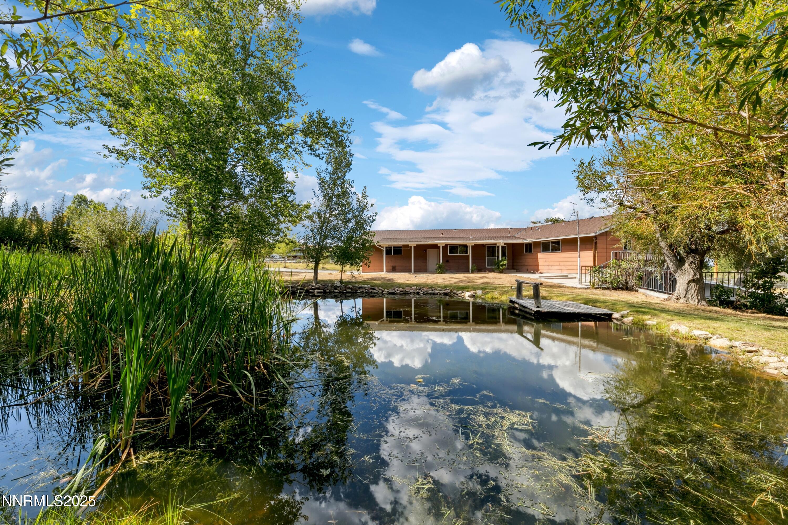 3550 Lone Tree Lane Reno, NV 89511 - Photo 14 of 40 a view of a house with backyard and sitting area