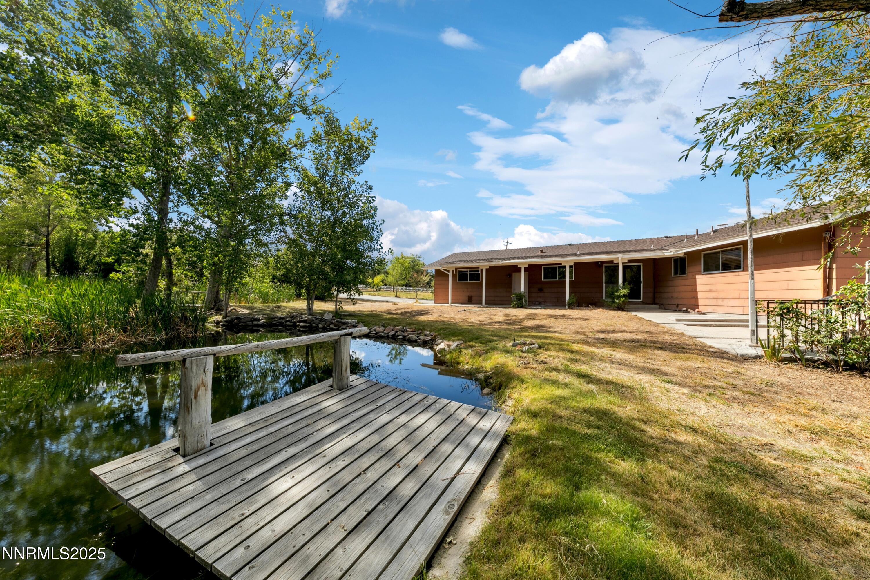 3550 Lone Tree Lane Reno, NV 89511 - Photo 16 of 40 a view of house with backyard and sitting area