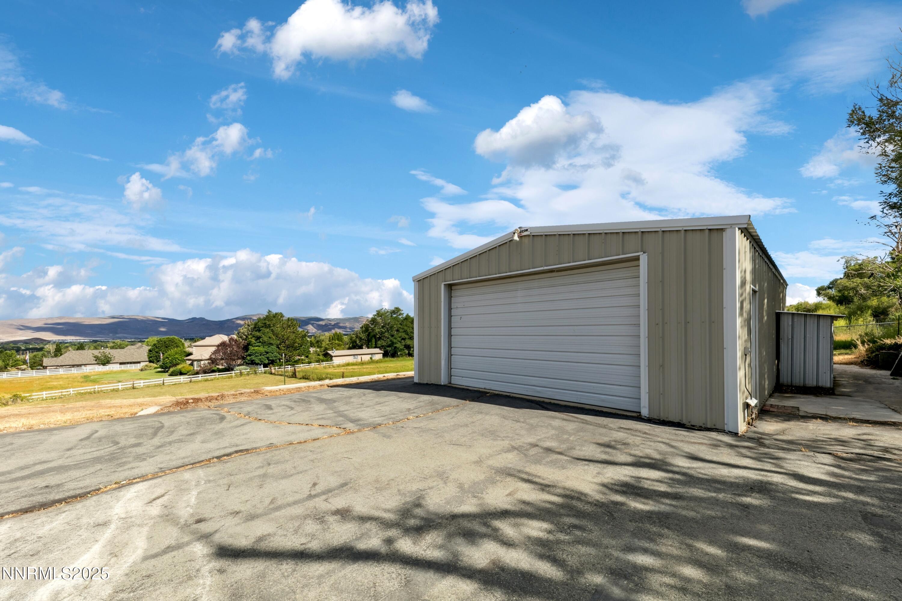 3550 Lone Tree Lane Reno, NV 89511 - Photo 19 of 40 a view of a house with a yard