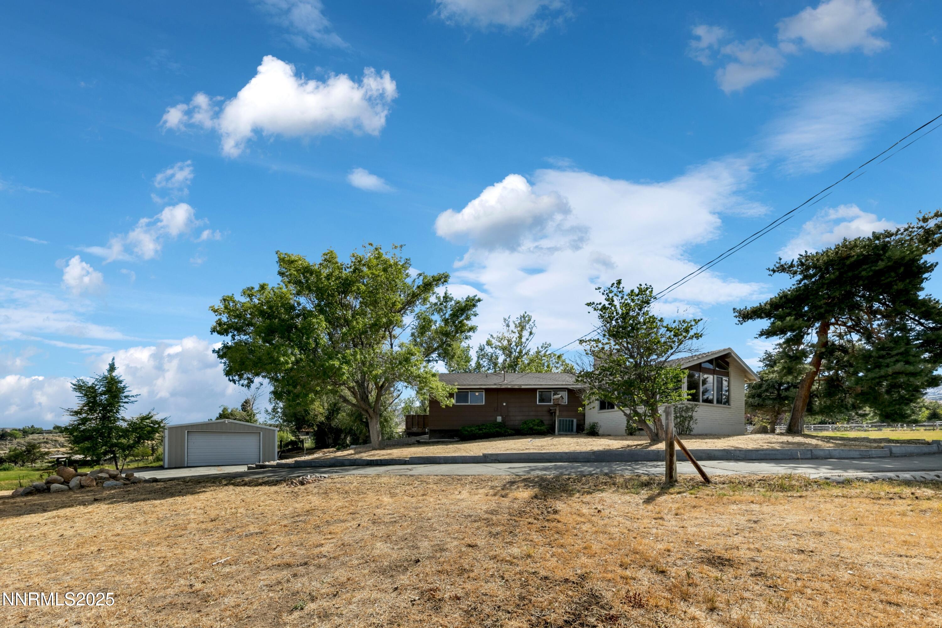 3550 Lone Tree Lane Reno, NV 89511 - Photo 22 of 40 a house view with a garden space