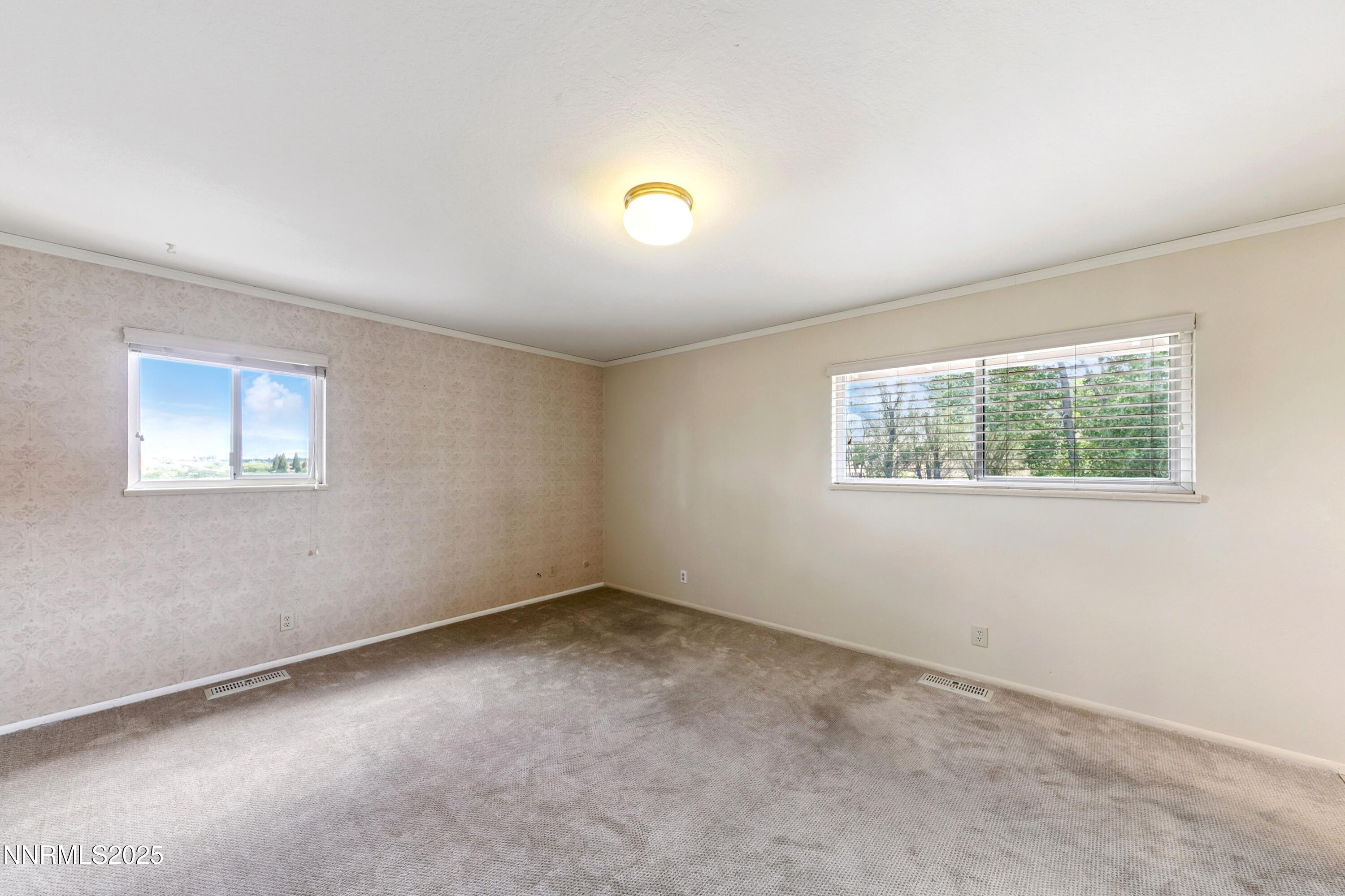 3550 Lone Tree Lane Reno, NV 89511 - Photo 33 of 40 an empty room with a window