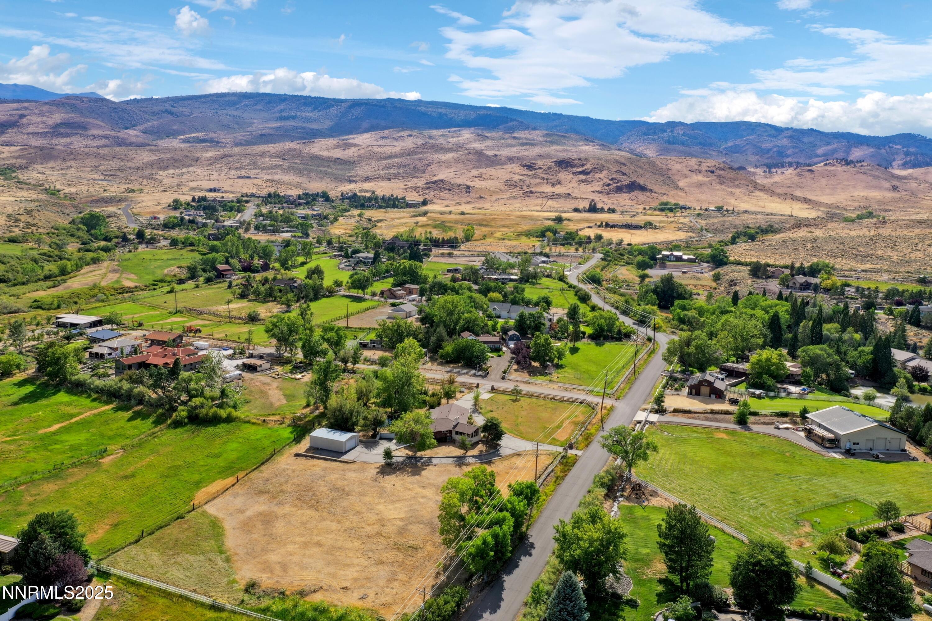 3550 Lone Tree Lane Reno, NV 89511 - Photo 38 of 40 a view of a city with mountains in the background