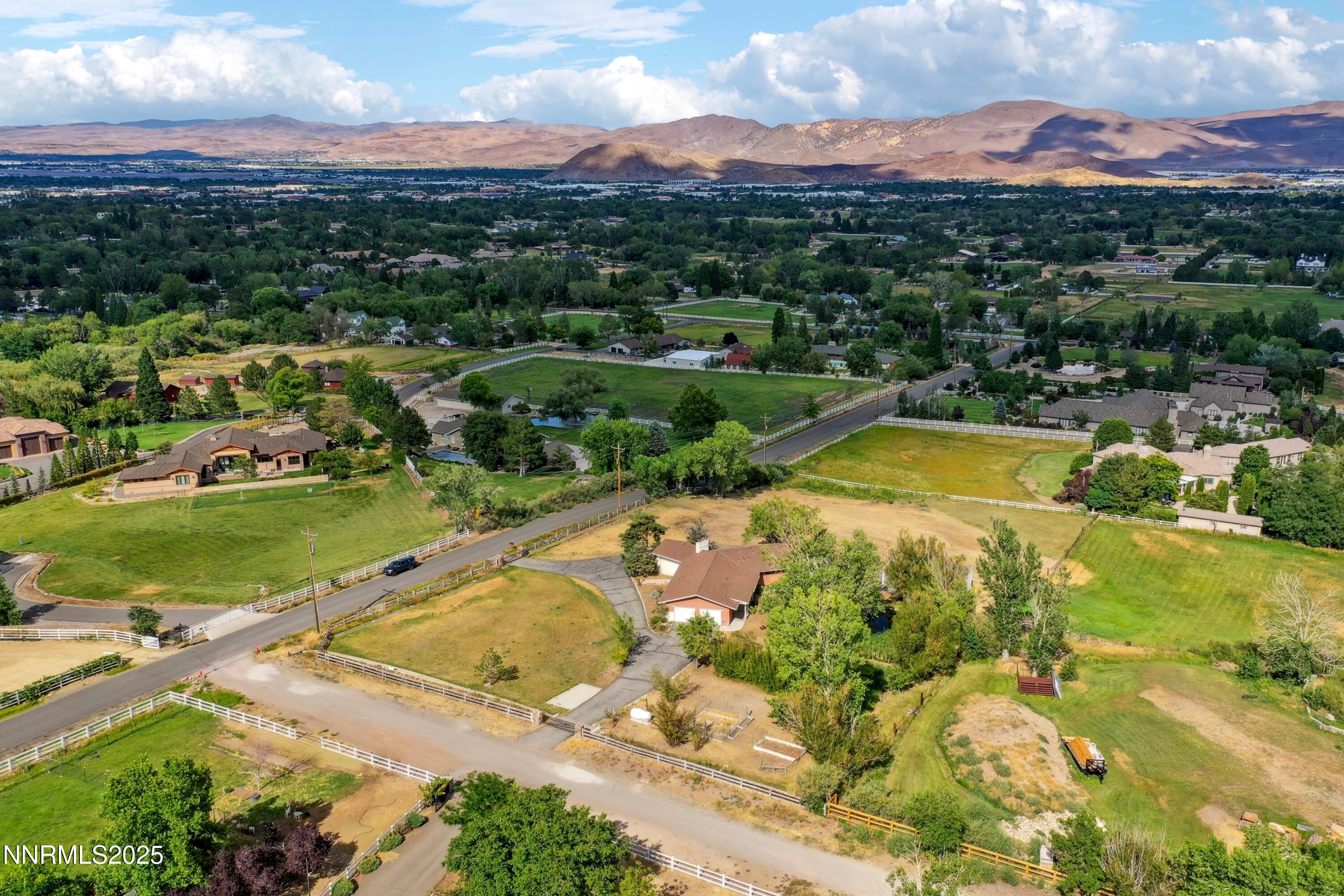3550 Lone Tree Lane Reno, NV 89511 - Photo 5 of 40 a view of a swimming pool with a lake