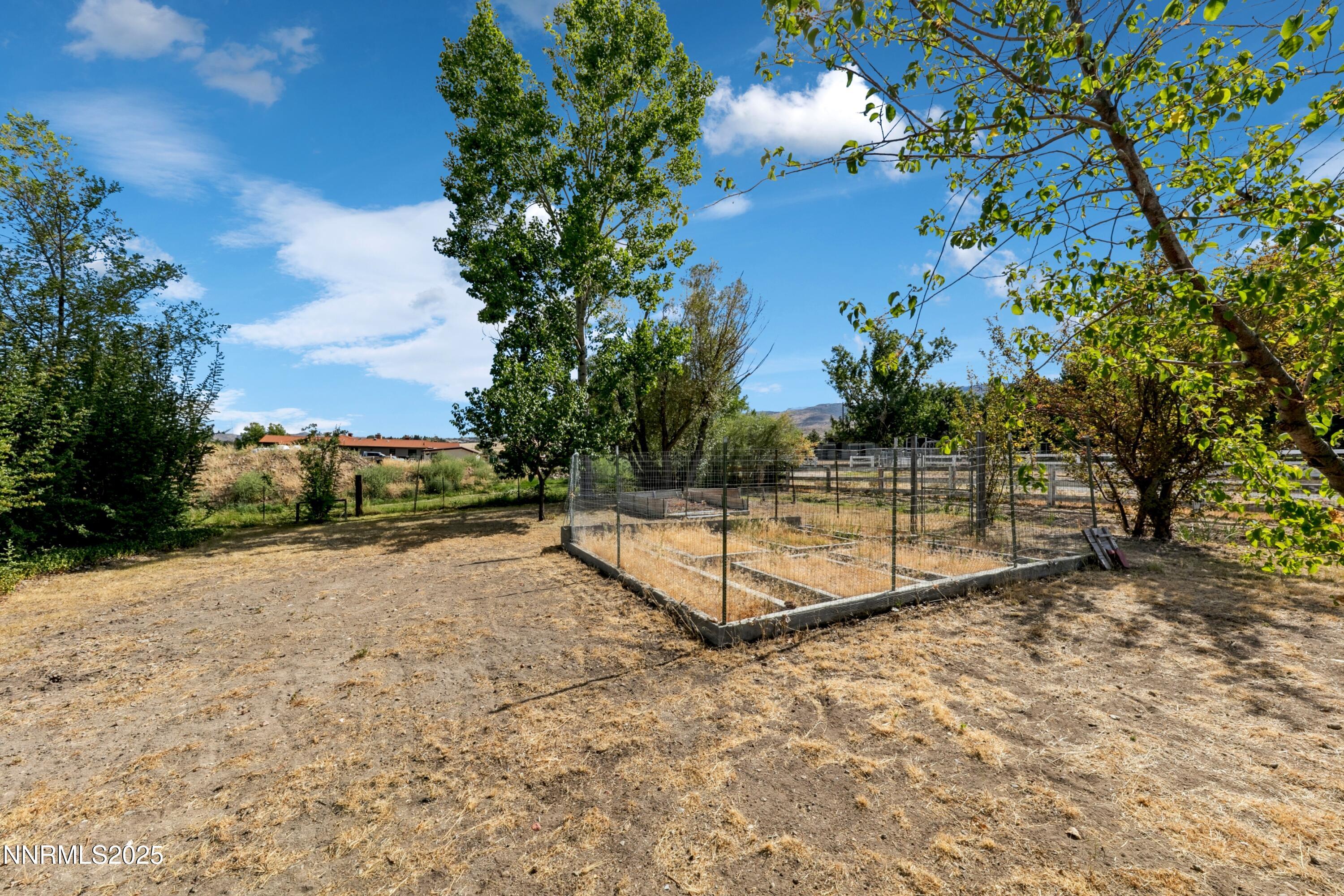 3550 Lone Tree Lane Reno, NV 89511 - Photo 9 of 40 a view of a yard with basketball court