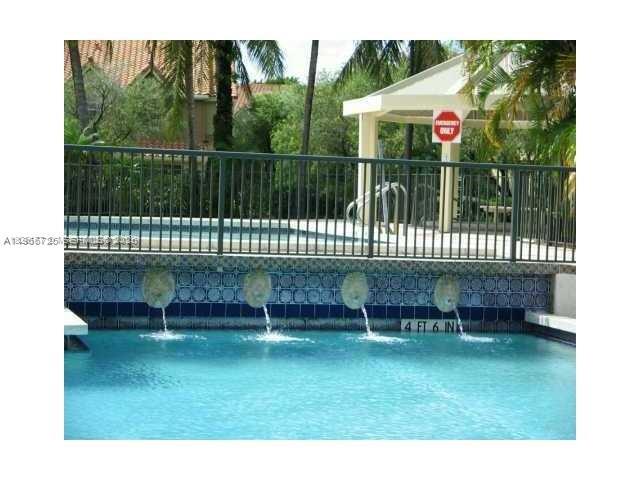 18330 Northwest 68th Avenue, Unit A Hialeah, FL 33015 - Photo 5 of 14 a view of a chair and table in the balcony