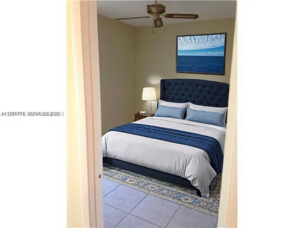 a bedroom with a bed and a cabinets