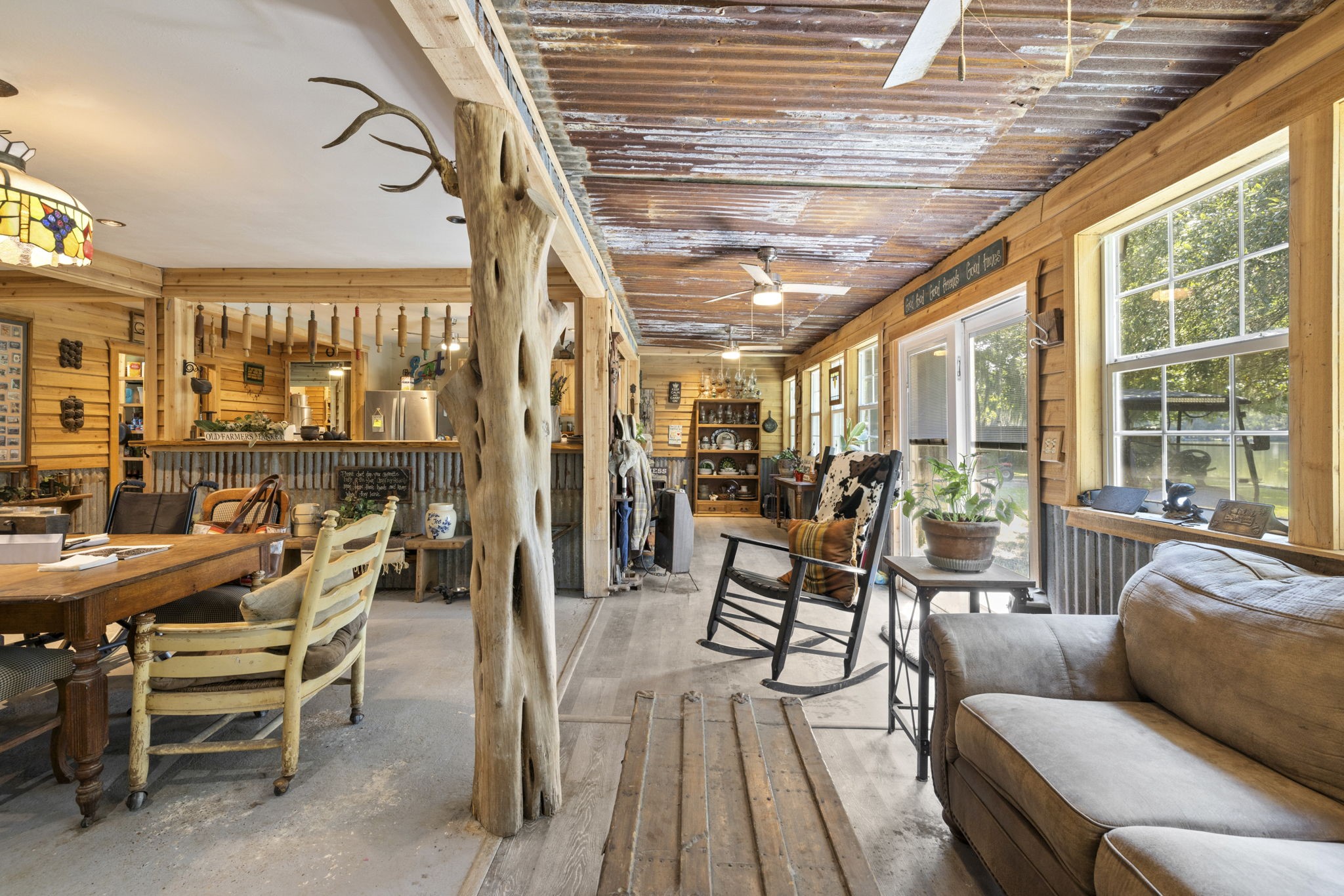 150 County Road 2122 Cleveland, TX 77327 - Photo 10 of 21 a living room with furniture and a large window
