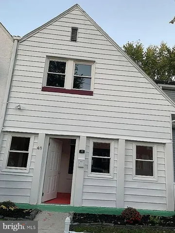 a view of a house with a garage