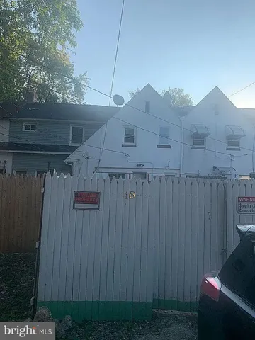 a living room with couch and a window
