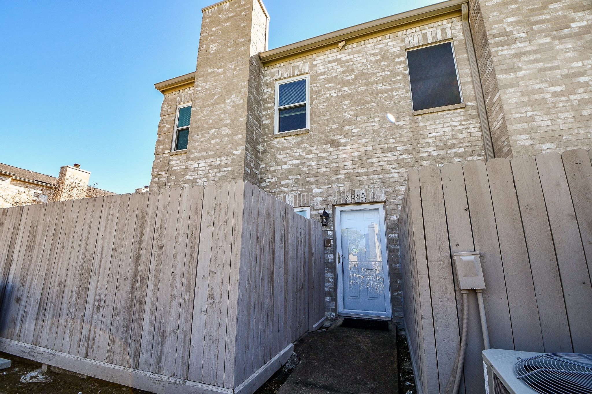 8085 El Mundo Street, Unit 8085 Houston, TX 77054 - Photo 23 of 32 a view of a house with wooden fence