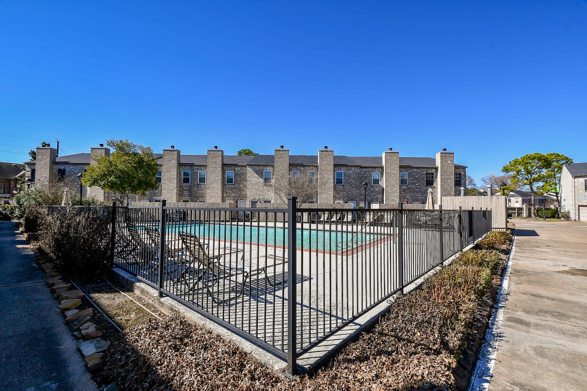 8085 El Mundo Street, Unit 8085 Houston, TX 77054 - Photo 25 of 32 a view of a balcony with city view