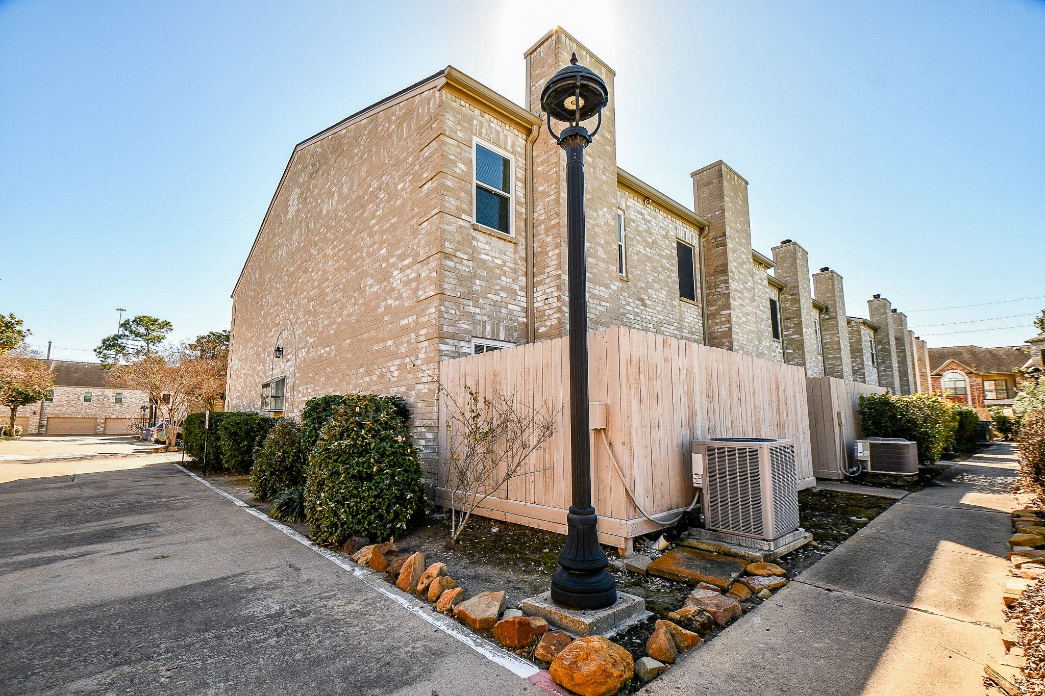 8085 El Mundo Street, Unit 8085 Houston, TX 77054 - Photo 28 of 32 a front view of a building with street