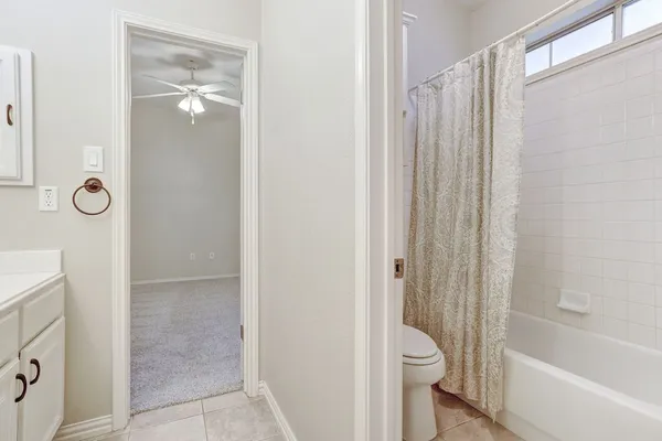 a bathroom with a sink double vanity and a mirror