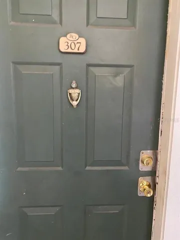 a view of door with washer and dryer