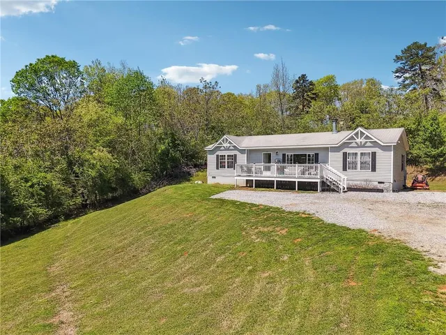 a view of a house with swimming pool