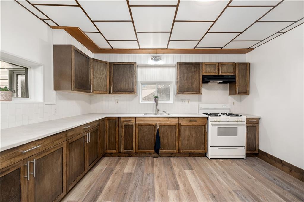 140 Whitestown Road Lyndora, PA 16045 - Photo 11 of 29 a kitchen with a sink cabinets and stainless steel appliances