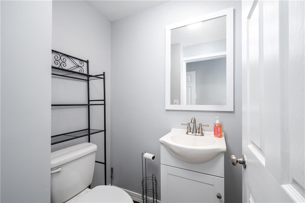 140 Whitestown Road Lyndora, PA 16045 - Photo 15 of 29 a bathroom with a toilet sink vanity and mirror