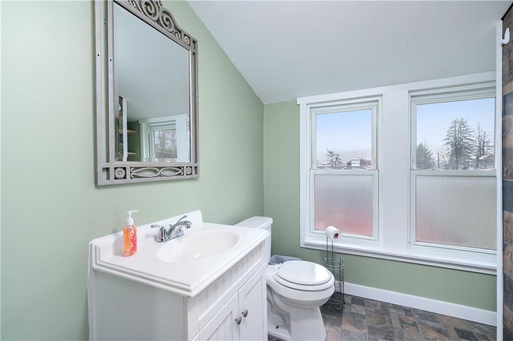 140 Whitestown Road Lyndora, PA 16045 - Photo 18 of 29 a bathroom with a sink toilet and a mirror