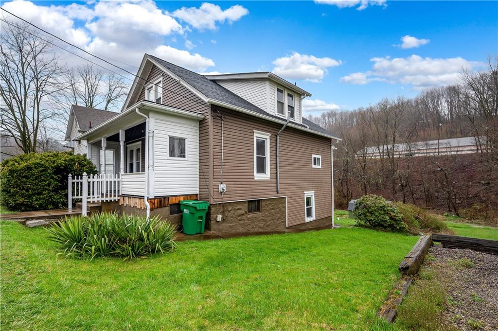 140 Whitestown Road Lyndora, PA 16045 - Photo 2 of 29 a front view of a house with garden