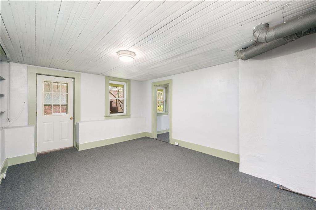 140 Whitestown Road Lyndora, PA 16045 - Photo 22 of 29 an empty room with windows