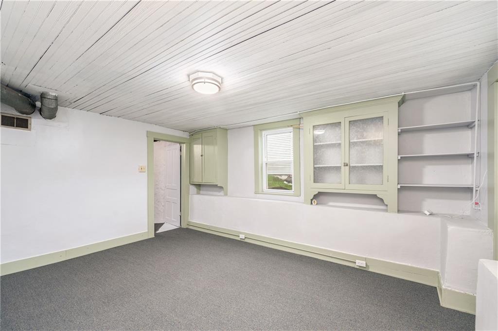 140 Whitestown Road Lyndora, PA 16045 - Photo 23 of 29 a view of an empty room with a window