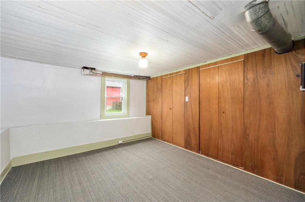 140 Whitestown Road Lyndora, PA 16045 - Photo 24 of 29 a view of an empty room with a window