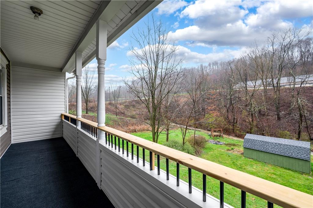 140 Whitestown Road Lyndora, PA 16045 - Photo 26 of 29 a view of a porch with a yard