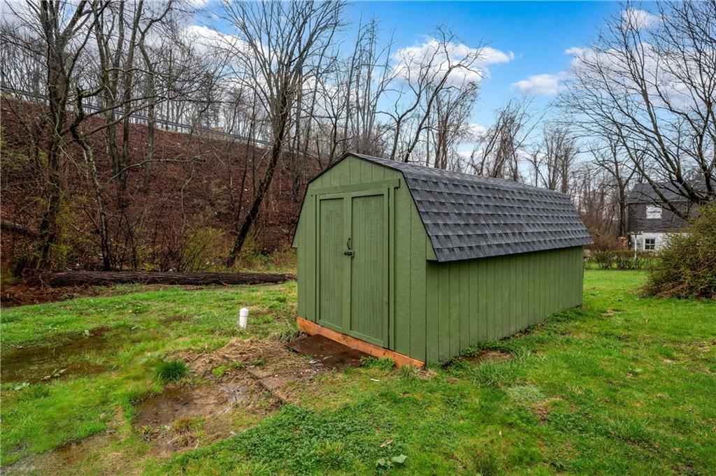 140 Whitestown Road Lyndora, PA 16045 - Photo 29 of 29 a view of a backyard with a garden