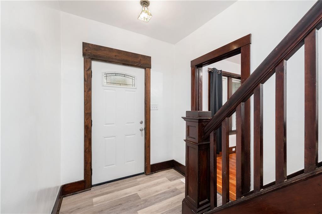 140 Whitestown Road Lyndora, PA 16045 - Photo 4 of 29 a view of an entryway with wooden floor