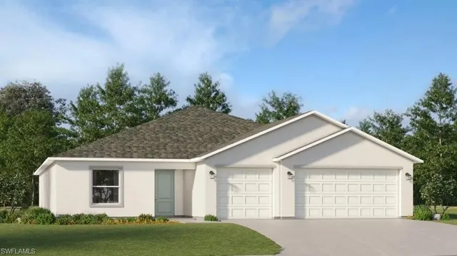 a view of a backyard with plants and lake view