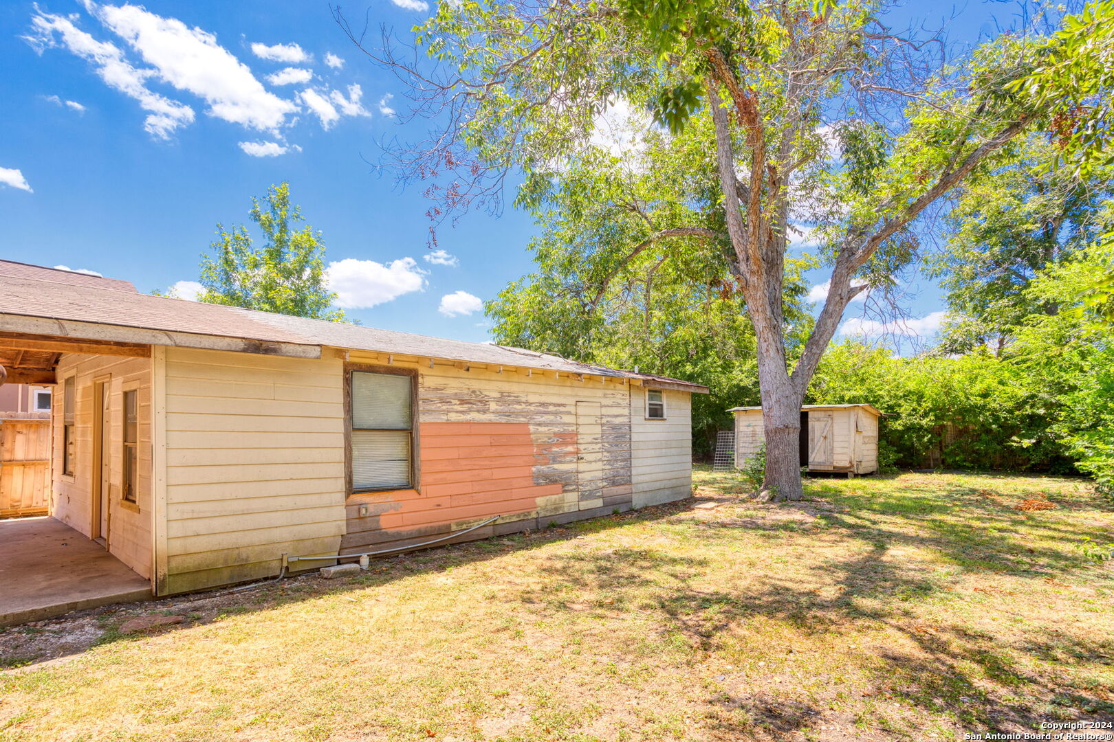 113 Vista Road San Antonio, TX 78210 - Photo 16 of 17 a view of a house with a large tree