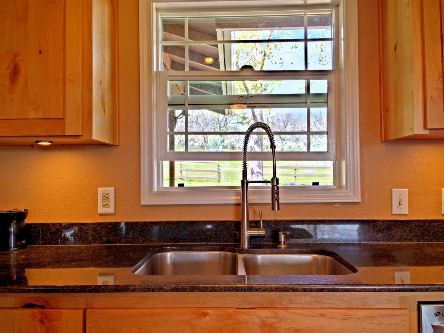 1753 Eagle Heights Road Eagle Point, OR 97524 - Photo 6 of 29 Undermount sink overlooks the backyard.