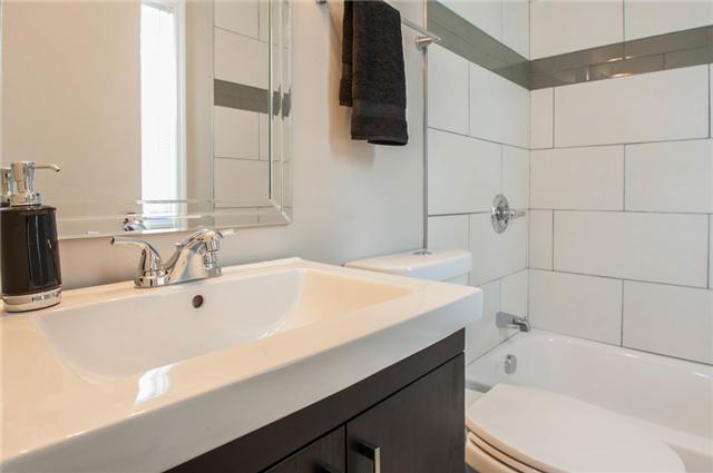 3038 Hillside Road Nashville, TN 37207 - Photo 5 of 16 The Fabulous finishes continue into the bathroom, where you'll find a wall mounted vanity and custom tile work in the shower.