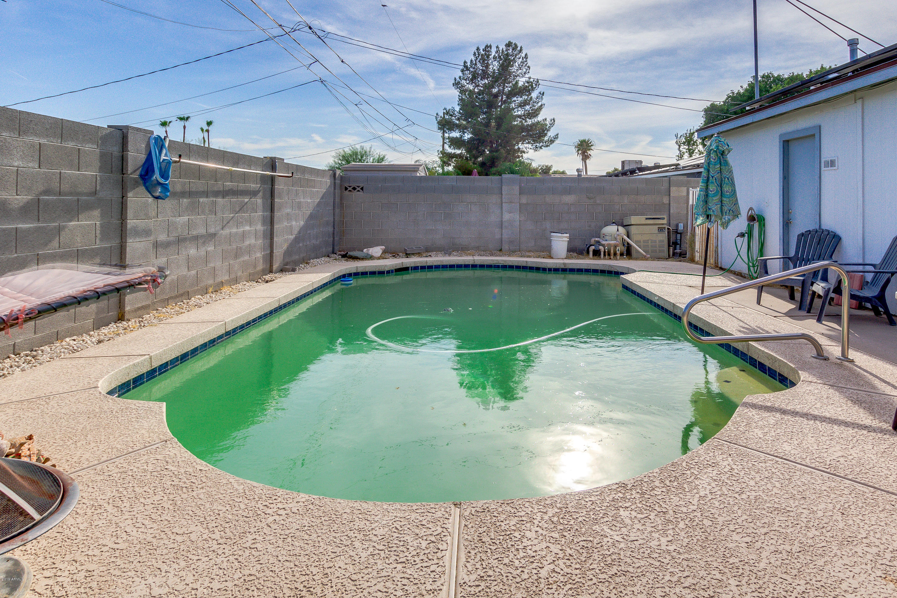 3021 West Bloomfield Road Phoenix, AZ 85029 - Photo 27 of 27 a view of a swimming pool with a patio