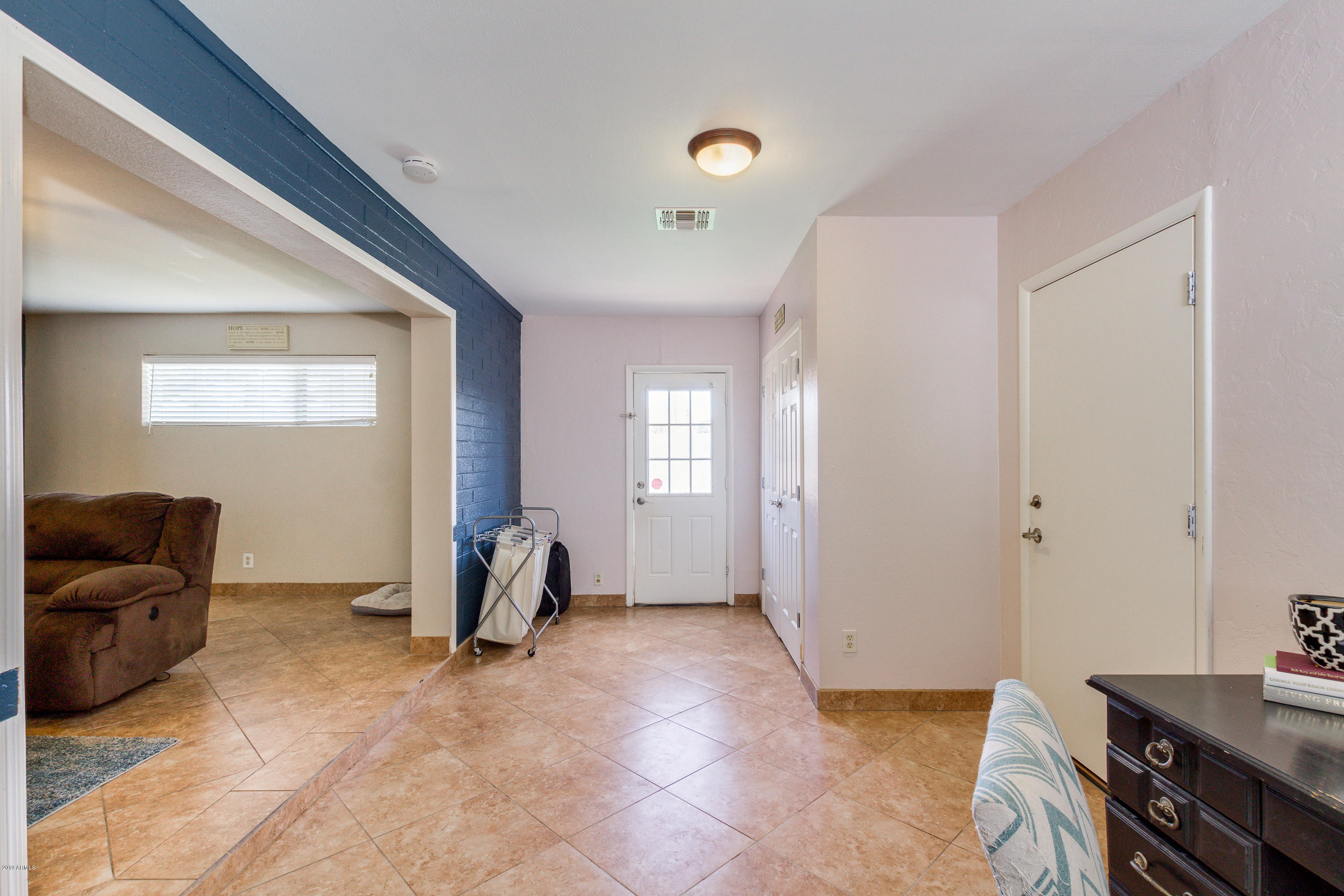 3021 West Bloomfield Road Phoenix, AZ 85029 - Photo 9 of 27 a view of workspace with furniture and window