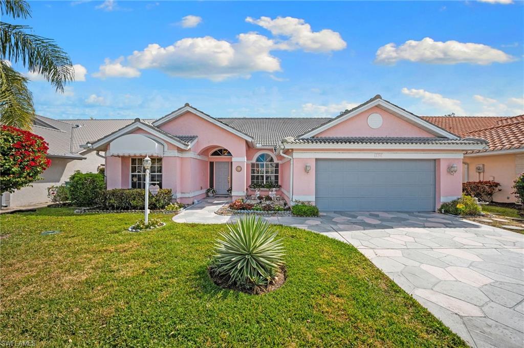 256 Countryside Drive Naples, FL 34104 - Photo 28 of 40 Front of Home