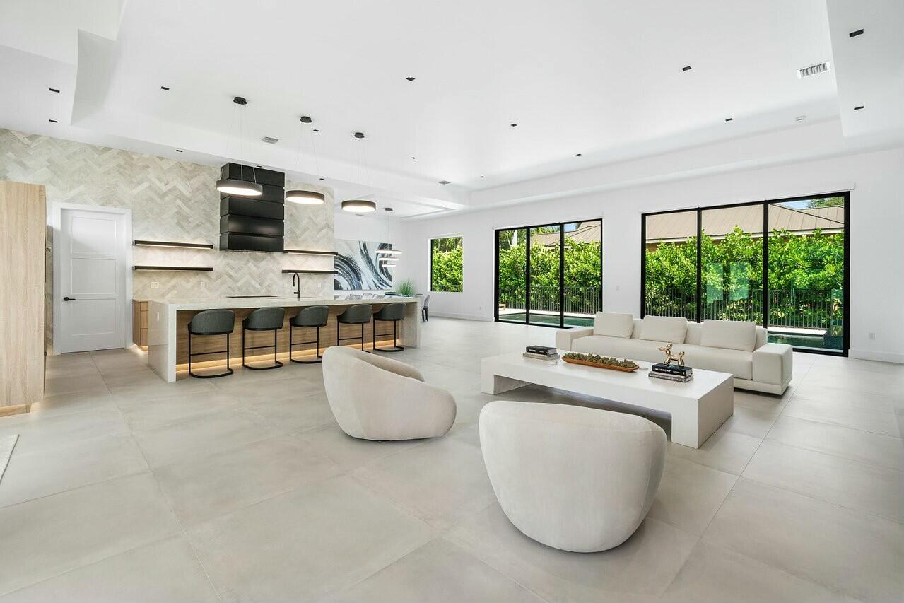 751 Pelican Way North Palm Beach, FL 33408 - Photo 15 of 39 a living room with furniture and a large window