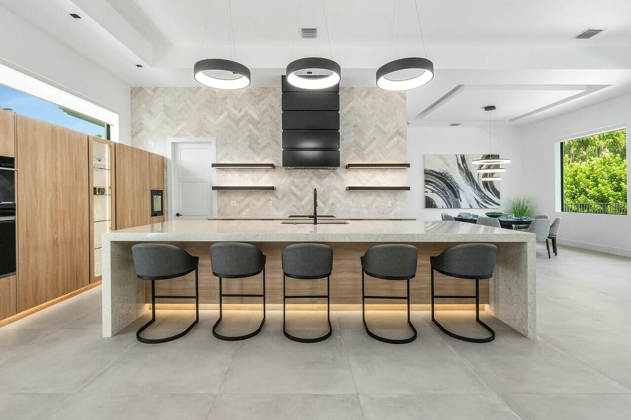 751 Pelican Way North Palm Beach, FL 33408 - Photo 18 of 39 a room with furniture and a large window